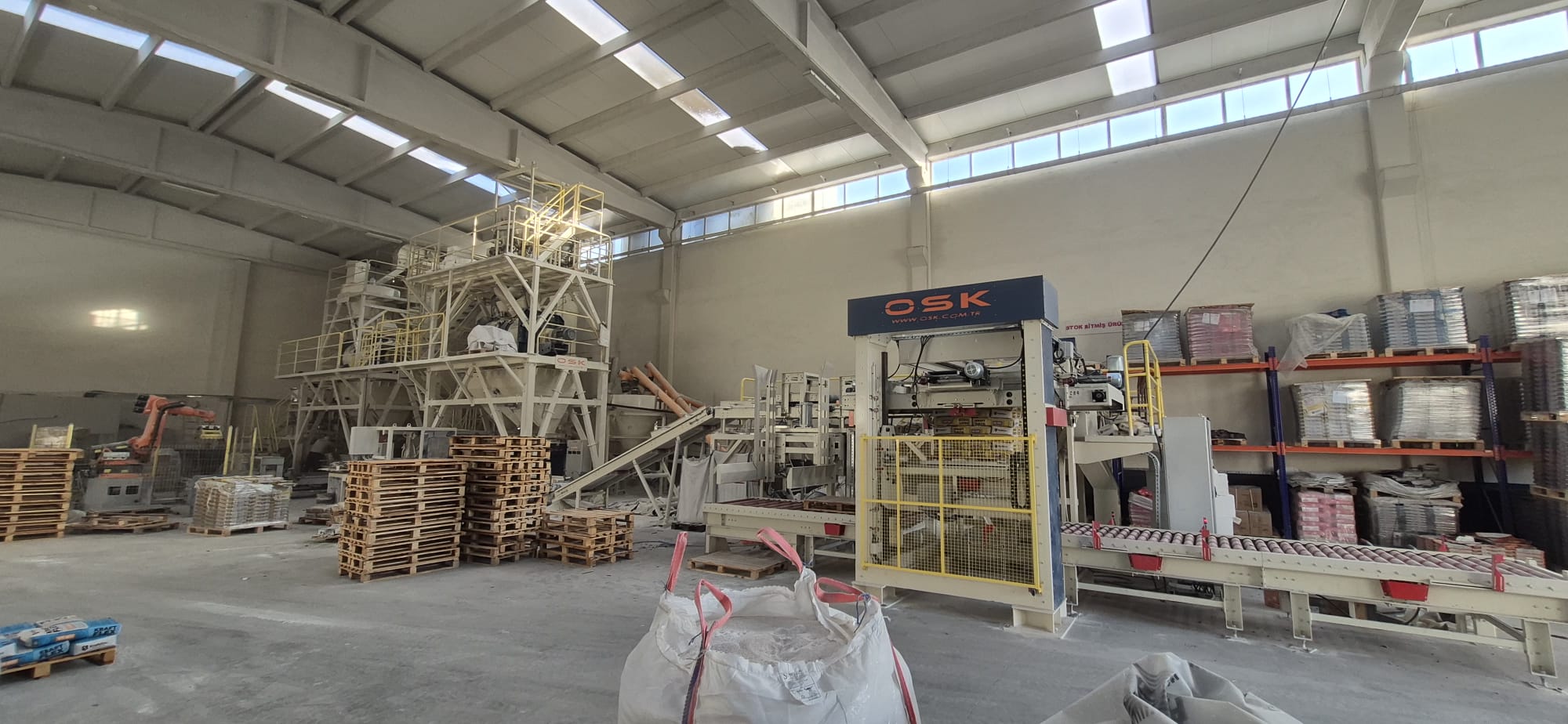 Dry Mortar Machine | Dry Mortar Plants & Industrial Solutions - Automatic packing and stacking equipment